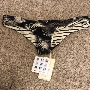 Billabong reversible swimsuit bottoms. Large